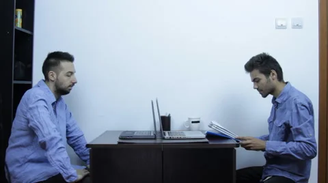 Students Working In Internship, Looking At Documents, Young, Business, Long Shot Stock Footage 41393477