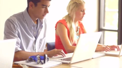 Students Working on Laptop Computers - Tracking Shot Stock Footage 6447489