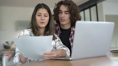 Students working together on school project Stock Footage 130306402