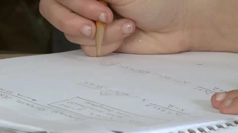 Students writing in their notebook in classroom (3 of 3) Stock Footage 10330879