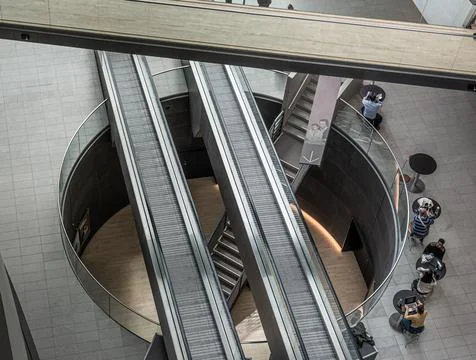 Studets having lunch in the hall of the modern danish library the black diamo Stock Photos