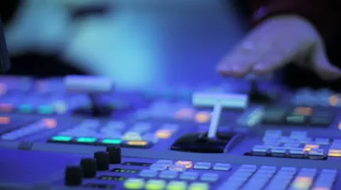 Studio 13 - A studio director during setting up a mixing desk in a studio Stock Footage 10770244
