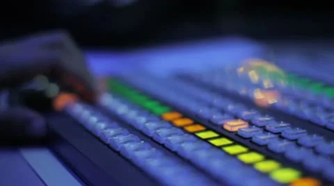 Studio 6 - A studio director during setting up a mixing desk in a TV studio 動画素材 10768924