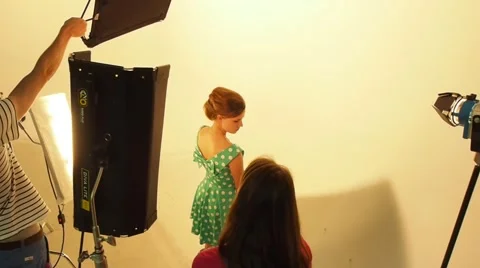 Studio and crew setting up light.  Stock Footage 56680045