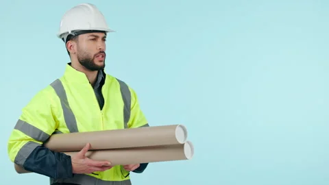 Studio architect, blueprint and man explain engineering design, mockup space or Stock-Footage 250200616
