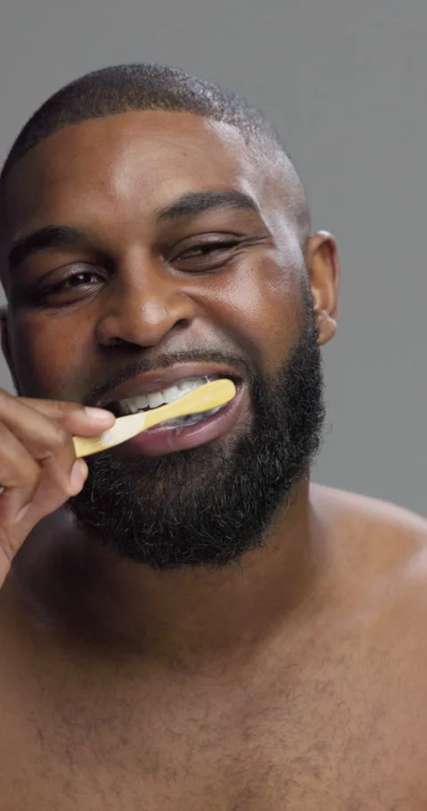 Studio, black man and wellness with toothbrush for dental, cleaning and oral Stock Footage 308689332