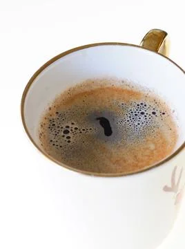 Studio close up of isolated coffee cup of black coffee against a white Stock Photos