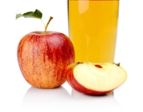 Studio cropped shot of red apple with leaf and apple juice isolated on a whit Stock Photos