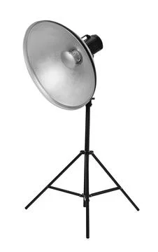 Studio flash light with reflector on tripod against white background. Profess Stock Photos