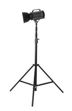 Studio flash light on tripod against white background. Professional photograp Stock Photos