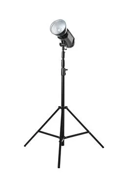 Studio flash light on tripod against white background. Professional photograp Stock Photos