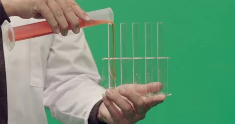 Studio, green screen, close-up of test tubes being filled, London, UK Stock Footage 139894478