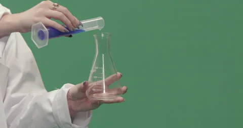 Studio, green screen, a close-up of test tubes being filled, London, UK Stock Footage 139895334