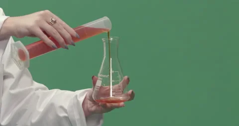 Studio, green screen, a close-up of test tubes being filled, London, UK Stock Footage 139895360