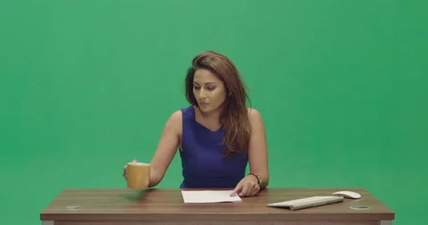 Studio, green screen, a young female reporter prepares herself, London, UK Video stock 139885448