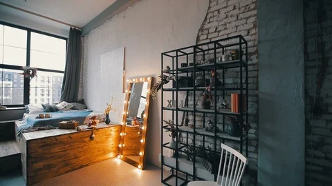 Studio interior loft bedroom in a daylight Stock Footage 121708912