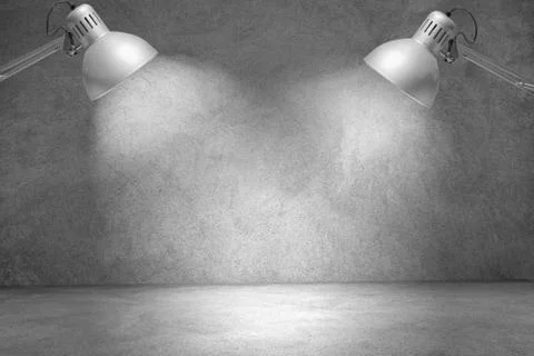 Studio interior with white wall and spotlights. Stock Photos