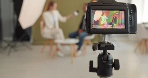 Studio Interview on Camera with Journalist and Guest, Professional Media Setup Stock Footage 347411141