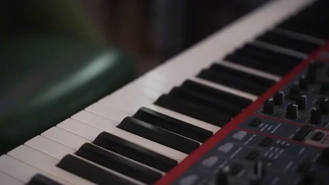 Studio Keyboard Shot, Intimate Shot Showcasing Synthesizer With Subtle Human Video stock 323777745