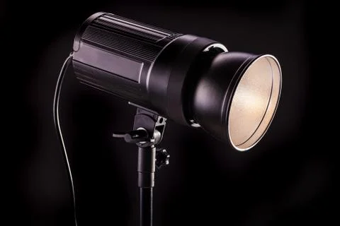 Studio light strobes on black background Foto stock