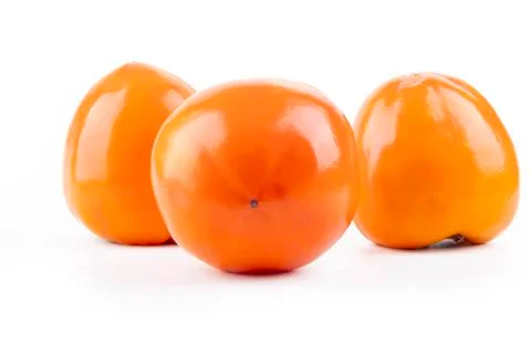 Studio lighting. persimmon fruit on a white background. There is a shadow. Cl 스톡 사진