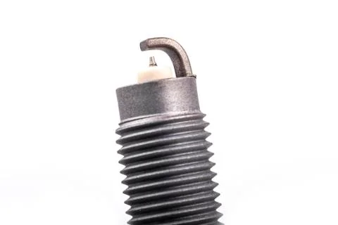 Studio lighting. spark plug from a gasoline engine. It is matte. Close-up. Fotos de archivo