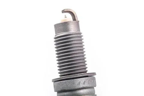 Studio lighting. spark plug from a gasoline engine. It is matte. Close-up. Fotos de archivo