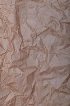 Studio lighting. texture. a sheet of crumpled gray paper. close-up Stock Photos