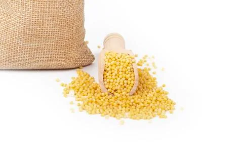 Studio lighting. White background. Close-up of cereals. Millets are placed in Foto stock