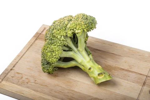 Studio lighting. white background. green broccoli close-up Stock Photos