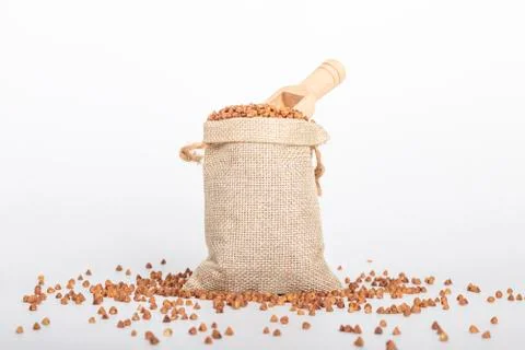 Studio lighting. on a white background, not a large bag of flax, buckwheat is Stock Photos