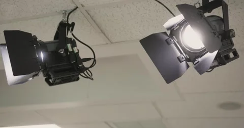 Studio lights pan and lens flare Stock Footage 137739272