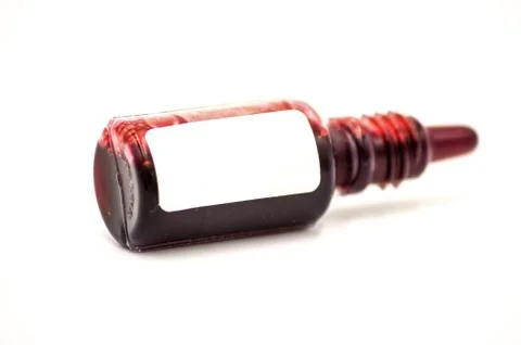 Studio macro of a pharmacy flask filled with red liquid Stock Photos