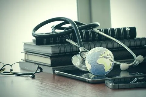Studio macro of a stethoscope and texture globe with digital tablet with sh.. Stock Photos