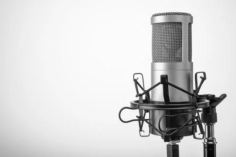 Studio microphone on the gray background. Copy space. 스톡 사진