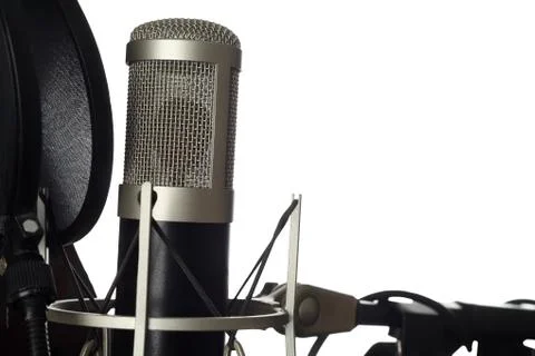 Studio microphone with pop filter close-up. Isolated on white background Stock Photos