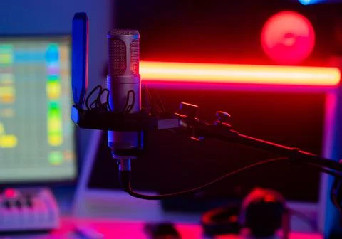 Studio microphone in a recording studio with neon light Stock-Fotos