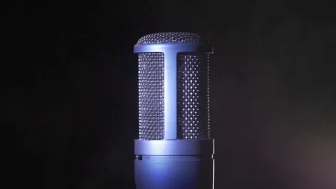 A studio microphone is sorrounded by a thick white smoke. Stock Footage 116136523