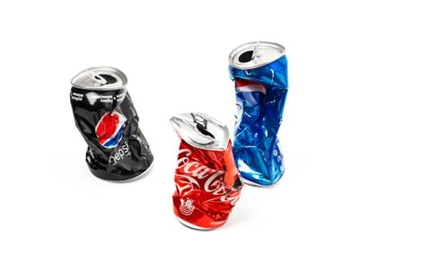 Studio photo of empty and crashed Pepsi and Cola aluminum cans Stock Photos
