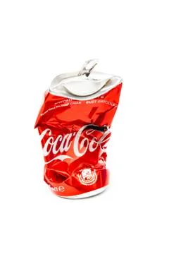 Studio photo of empty and crashed Coca Cola can Stock Photos