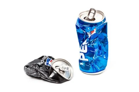 Studio photo of empty and crashed Pepsi aluminum two can 库存照片