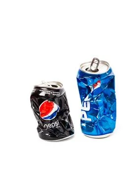 Studio photo of empty and crashed Pepsi aluminum two can Stock Photos