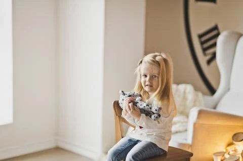 Studio portrait of the child at the window 7312. Stock Photos