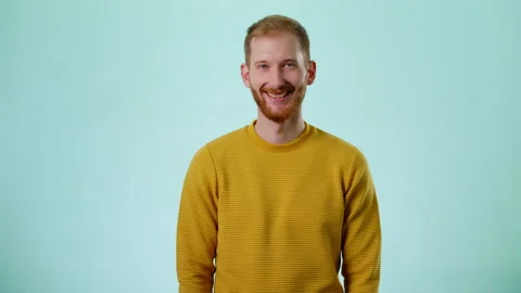 Studio Portrait Of Confident Bearded Young Caucasian Man With Hands On Hips Stock Footage 170191450