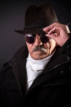 Studio portrait of an expressive old man 写真素材