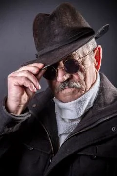 Studio portrait of an expressive old man Stock Photos