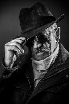 Studio portrait of an expressive old man Stock Photos