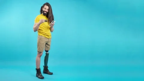Studio portrait of a man with prosthesis on his leg Stock Footage 231603550