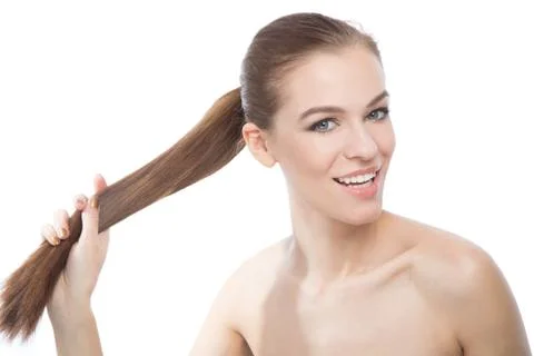 Studio portrait of a model showing her healthy shining hair Stock Photos