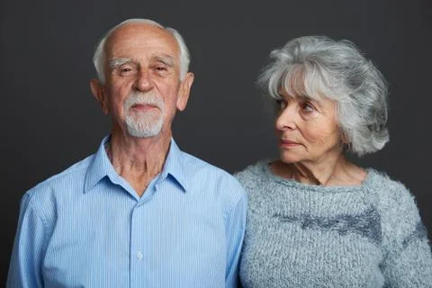 Studio Portrait Of Senior Couple Stock Photos